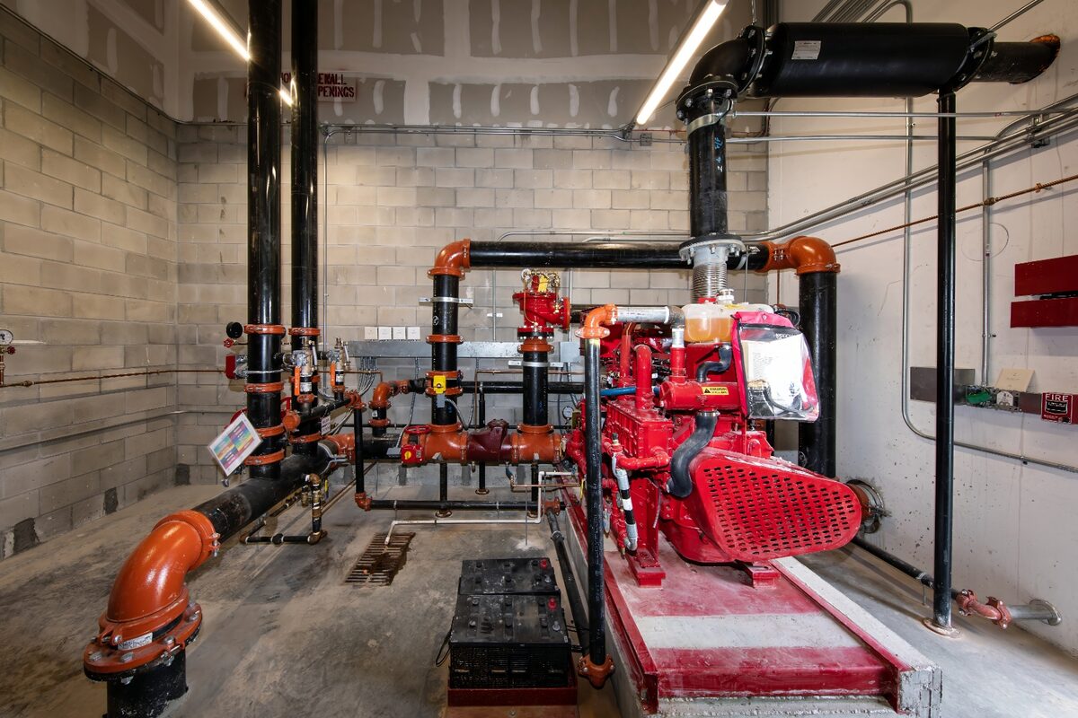 Diesel-driven fire pump with cast-iron suction and discharge manifolds at a Texas commercial property